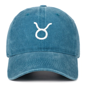 Vintage washed blue cotton baseball cap featuring white Taurus constellation embroidery