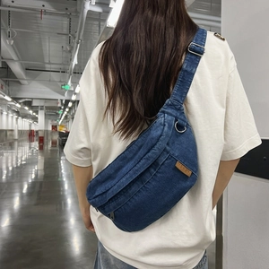 Unisex dark blue denim chest bag with adjustable strap and vintage fashion leather patch