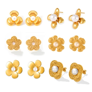 Set of six gold-plated floral stud earrings with white pearls in diverse textures