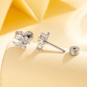 Sweet moon and star cartilage piercings with sparkling zircon stones in silver finish