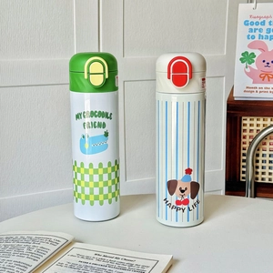 Detail of cartoon insulated bottles with crocodile prints and secure safety locks