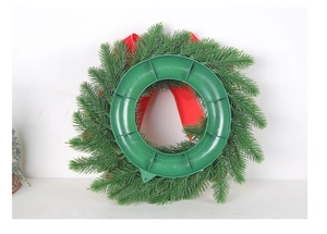 Detailed back view of a green Christmas wreath showing a sturdy plastic support frame