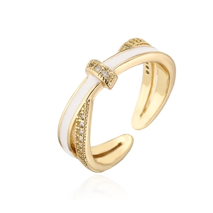 Crossed 18K gold plated ring with white enamel and sparkling zircon accents
