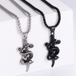 Detailed close-up of snake coiled around a sword pendant in silver and black finish