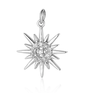 Detailed macro view of silver sunburst pendant with sparkling clear zircon inlay on white back