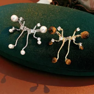 Artistic silver needle earrings with tiger eye stone and zircon in luxury branch design