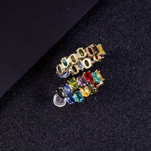 Rainbow gemstone stud earrings with colorful oval crystals on gold-plated base and silicone backs