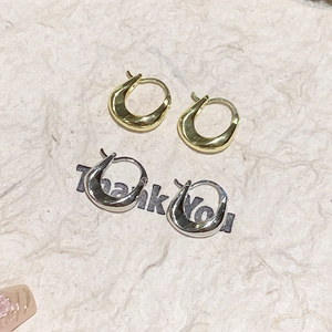 Polished 18K gold and silver plated U-shaped earrings in a two-pair fashion set