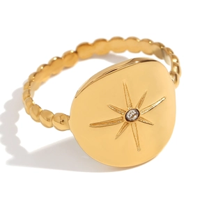 18K gold-plated stainless steel beaded ring with starburst motif and clear diamond
