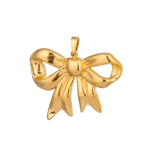 Macro shot of a 18K gold plated bow pendant with a smooth polished mirror finish
