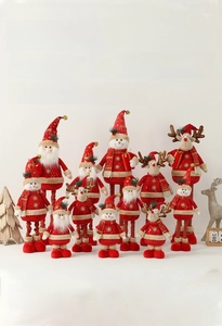 Detail of Christmas Santa, Snowman and Reindeer dolls with retractable legs in red and gold