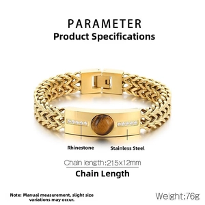 Detailed view of men's titanium steel bracelet with tiger eye stone and diamond inlay