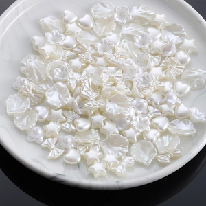 Mix of white faux pearl charms in star heart and flower shapes for DIY jewelry making