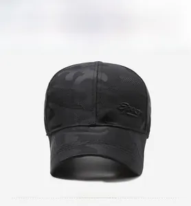 Detail of 3D Sport embroidery on camouflage baseball cap with black camo print