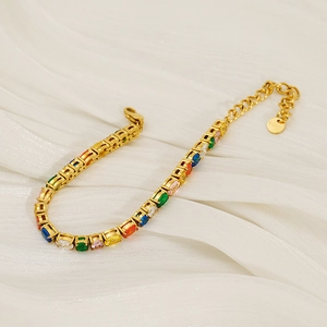 Detailed view of colorful square-cut zircon stones on a gold stainless steel tennis bracelet