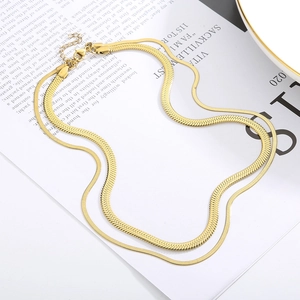 Double-layered golden herringbone snake chain necklace with a French vintage style for women
