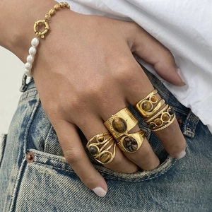 Vintage gold stainless steel rings with tiger eye stones and a pearl chain bracelet