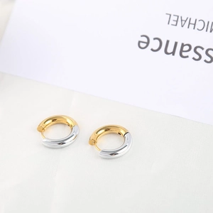 Modern two-tone gold and silver circular hoop earrings in polished stainless steel