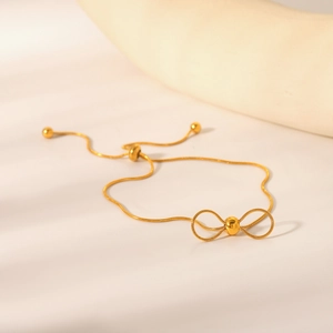 Bracelet élégant à nœud doré avec chaîne serpent et fermoir coulissant réglable pour femme