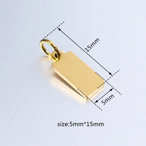 Macro shot of gold rectangular stainless steel tag with size 5x15mm dimensions