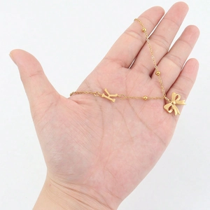 18K gold plated stainless steel necklace set with letter K and butterfly pendant