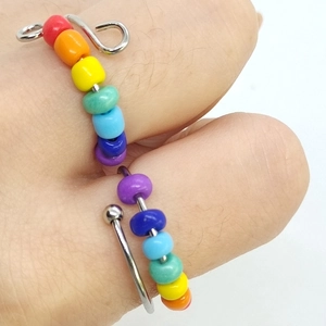 Handmade rainbow bead spinner ring in silver stainless steel with adjustable open band