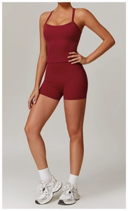 Deep red workout set featuring a U-neck sports bra and high-waisted shorts for women