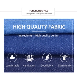 Dettaglio del tessuto denim blu di alta qualità che mostra una trama traspirante