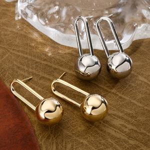 Chic geometric U-shaped metal ball earrings in polished gold and silver finishes
