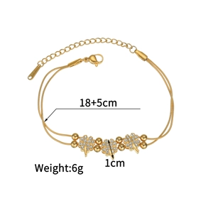 Detailed view of 18+5cm gold clover double bracelet showing size and S.Steel mark