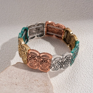 Retro multi-color elastic bracelet with daisy embossed oval beads in vintage metal finishes