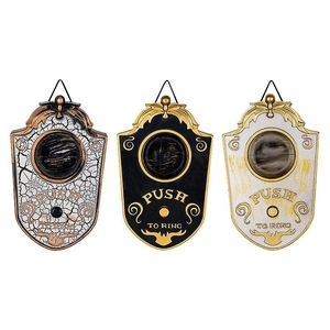 Three retro Halloween eyeball doorbells in white, black and silver with gold finish