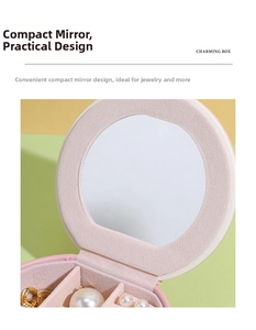 Boîte à bijoux rose portable avec miroir intégré et fentes en velours pour bagues