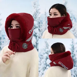 Winter windproof ski hat with faux fur trim and integrated face mask in dark red