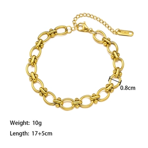 Macro detail of golden stainless steel chain bracelet with 0.8cm width and 10g weight