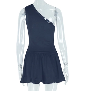 Detail of elegant black one-shoulder dress with ruffled hem on invisible mannequin