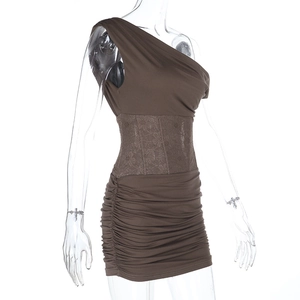 Detailed view of dark brown off-shoulder mini dress with lace waist and pleated skirt