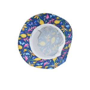 Tropical floral bucket hat with butterfly print and white lining for summer outdoor sun shade