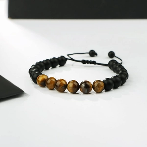 Bracelet fait main en œil de tigre et pierres noires mates avec cordon réglable