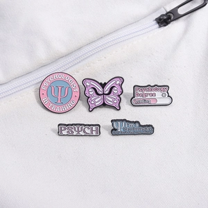 5pcs set of creative pastel psychology enamel pins displayed on white canvas bag