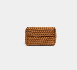 Detailed view of the brown woven texture and matte finish on the large bucket bag