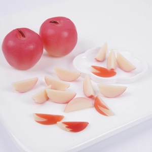 Miniature artificial apple slices and whole red fruit models for DIY dollhouse decor