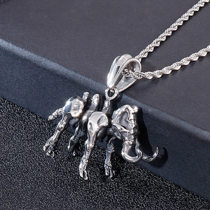 Detailed view of vintage silver elephant skeleton pendant with punk rope chain jewelry