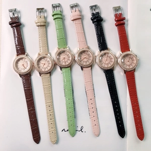 Detailed view of women's quartz watches with crocodile leather straps in six assorted colors