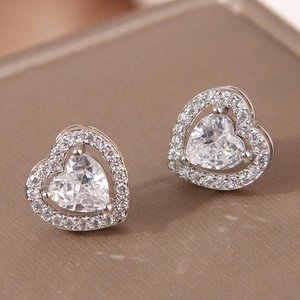 Elegant silver heart-shaped copper stud earrings with clear zircon stones for women