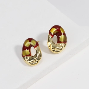 French vintage red and gold irregular enamel stud earrings on geometric stand