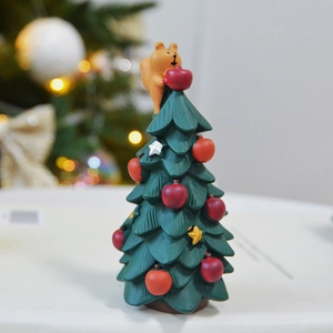 Resin Christmas tree ornament featuring a cute orange cat and festive red apple decorations