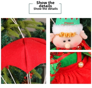 Detail of Christmas parachute elf with sequins, felt material and fine facial embroidery