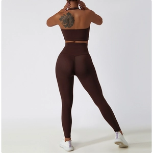 Back view of brown yoga set showing fitted halter top and high-waisted leggings