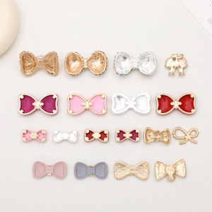 Detailed macro grid of colorful enamel bow charms for DIY phone cases and shoe accessories